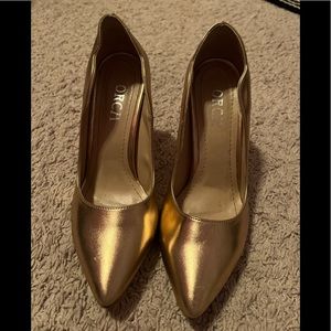 Beautiful shiny gold stiletto heels